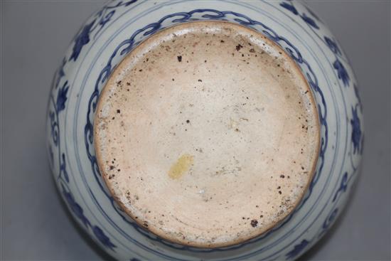 A Chinese blue and white bulbous vase, Ming, with restored rim, height 19cm